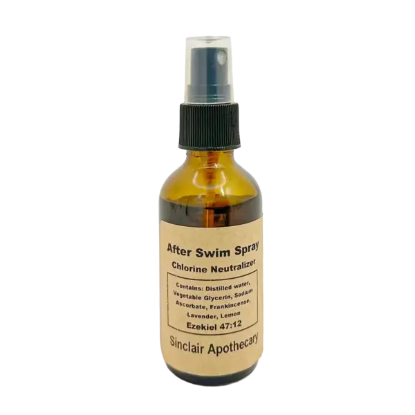 Amber glass spray bottle of After Swim Chlorine Neutralizer with natural ingredients, showcasing product label.