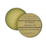 Natural fungal skin treatment in a rustic tin container, Sinclair Apothecary product isolate.