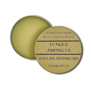 Natural fungal skin treatment in a rustic tin container, Sinclair Apothecary product isolate.