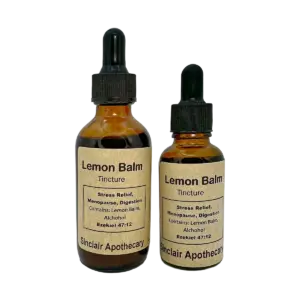 Two Sinclair Apothecary Lemon Balm Tincture bottles with labels showing health benefits and natural ingredients.