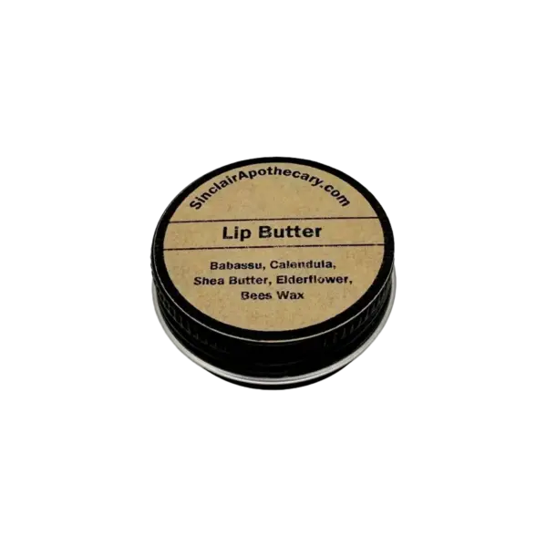 Natural lip balm in a black container with a paper label, featuring nourishing ingredients like shea, beeswax, babassu, calendula, and elderflower.