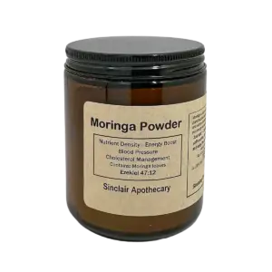 Jar of Sinclair Apothecary Moringa Powder with benefits for energy, blood pressure, and cholesterol.