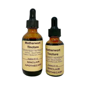 Two amber bottles of Motherwort Tincture with labels for hormone health and herbal remedy details.