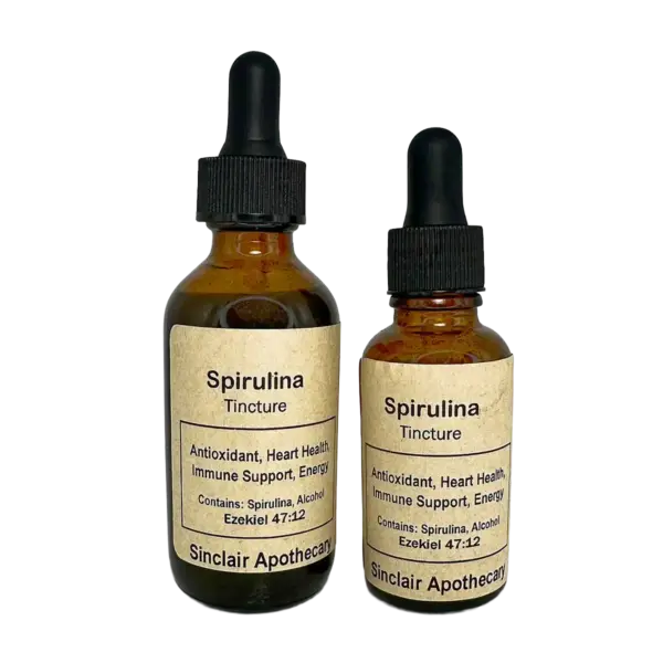 Two amber bottles of spirulina tincture with dropper tops, labeled for health benefits, on a white background.