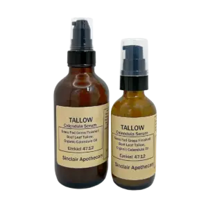 Amber glass bottles of TALLOW Calendula Serum with pump dispensers, featuring natural, organic skincare ingredients.