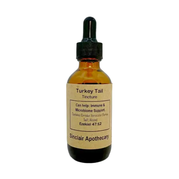 Amber glass Turkey Tail tincture bottle with dropper, labeled for immune and microbiome support.